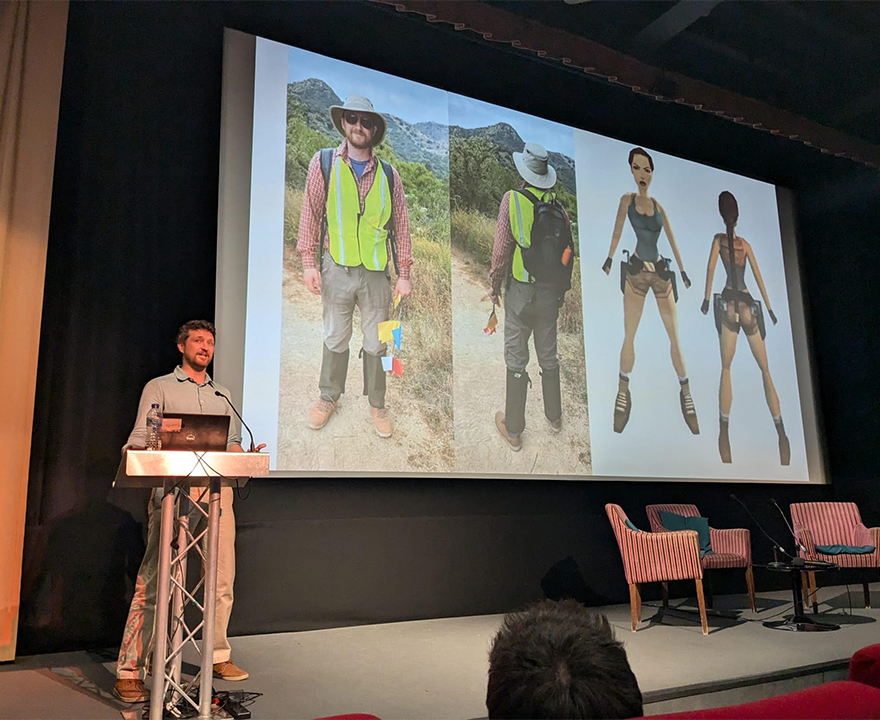 Christopher Lowman presenting at the Tomb Raider conference